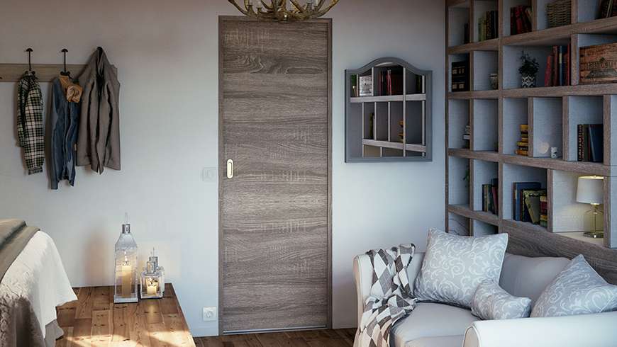 Une chambre d'adulte avec coin lecture