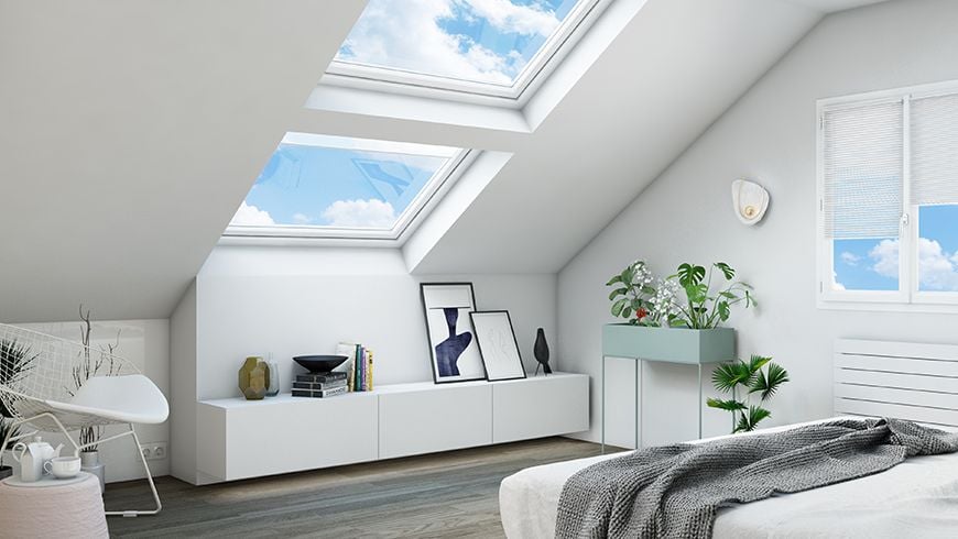 Une chambre moderne sous les toits