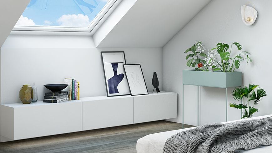 Une chambre moderne sous les toits