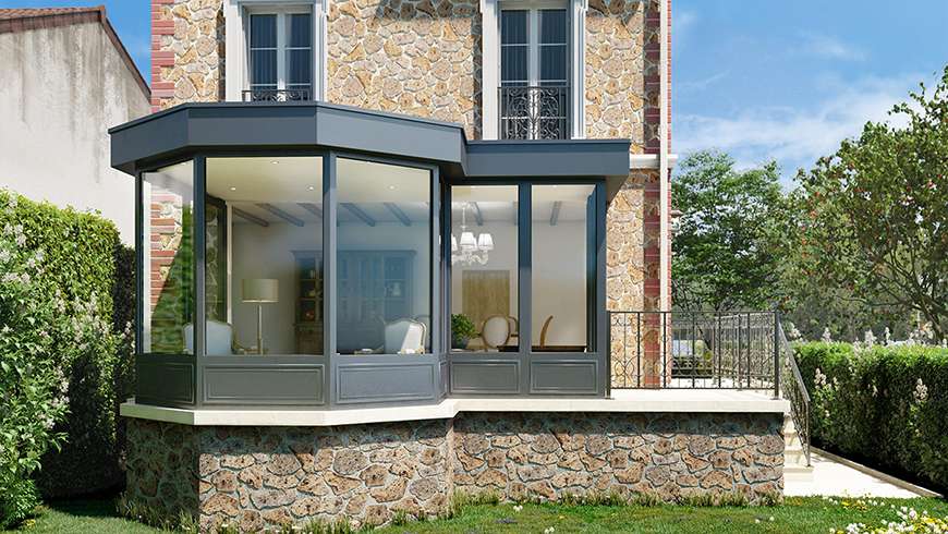 Une véranda à toiture plate