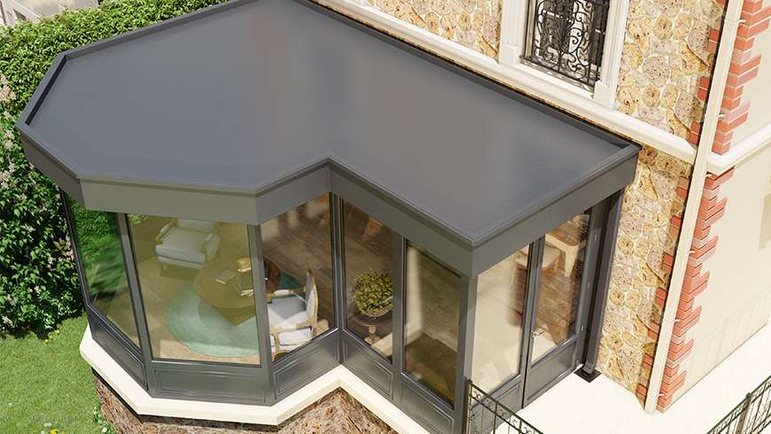 Une véranda à toiture plate