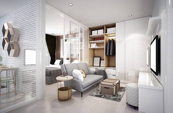 Aménager un petit appartement : la cloison en verre pour laisser passer la lumière