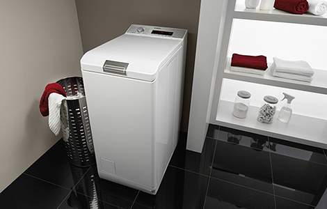 Le lave-linge à chargement par le haut, idéal dans une petite buanderie