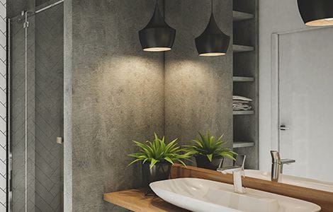 Revêtement mur salle de bain industrielle : le béton ciré