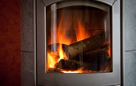 Le poêle à bois bûches