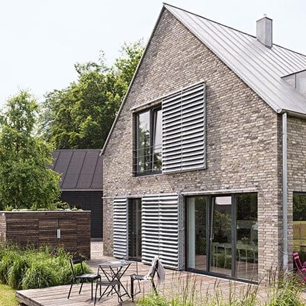 Mur pignon ouvert sur terrasse