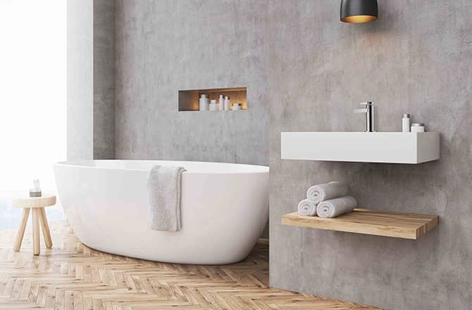 Une salle de bains contemporaine avec murs en béton ciré