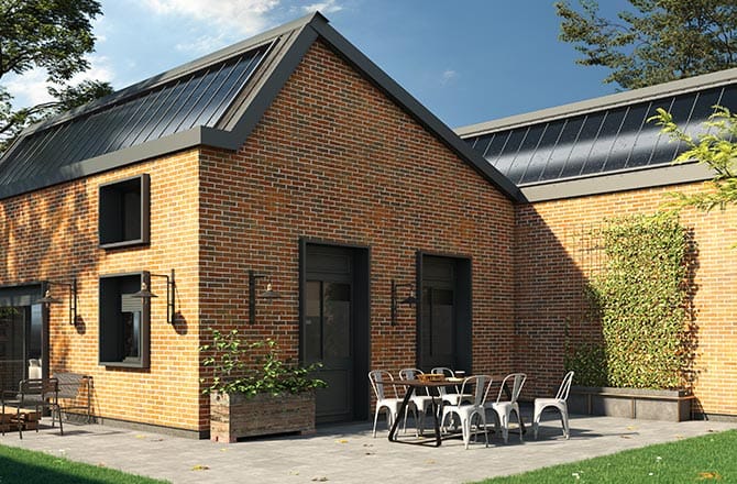 Une façade au parement en terre cuite et au style industriel