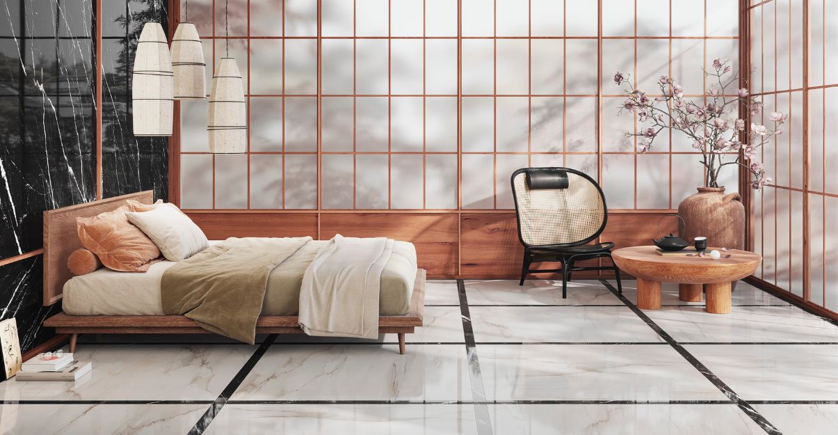 Une chambre au carrelage grand format sur sols et murs