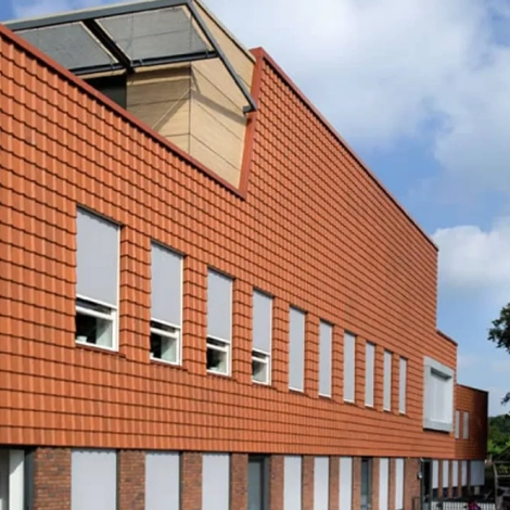 Collection de tuiles en bardage béton et terre cuite