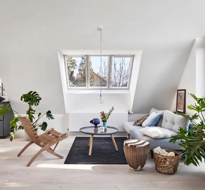 Aperçu de la verrière 3 en 1 Velux dans un salon sous toit